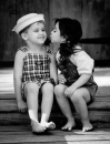 girl kissing boy