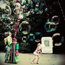 girl playing with  bubbles