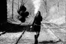Girl With Ballons In Left Hand