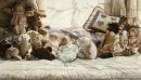 baby with dolls and teddy bears