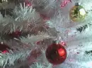 white tree red balls