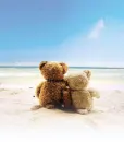 teddy bears on beach