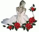 lady sitting with red flowers around her