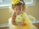 Cute little girl in yellow tutu