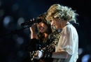 miley and taylor  singing