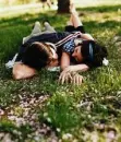 couple lying in grass