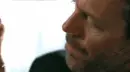 Hugh Laurie licking hand