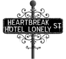 black street sign heartbreak hotel lonely ST
