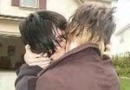 Gerad kissing a man