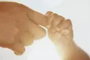 Child holding on