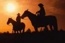 Cowboys at sunset