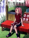 Sakura sitting by herself.