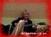 Ruki playing guitar