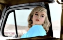 MARILYN LOOKING BACK IN HER CAR.