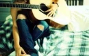 girl playing guitar