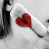 Girl making heart with fingers