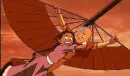 Aang glides across the sky while katara gets scared