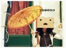 girl with box on her head