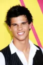 Taylor Launter in a short suit