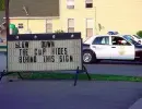 cops are behind this sighn!