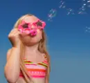 Girl  blowing bubbles
