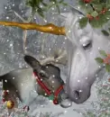 christmas unicorn with deer snowing
