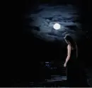sad gothic girl with full moon flashing