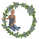 Woman sits in the flower wreath