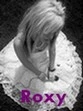Roxy in a white dress