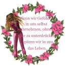Woman sits in the flower wreath