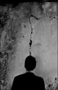 man and wall