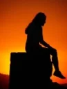 girl sitting alone