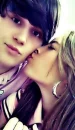 girl kissing boy