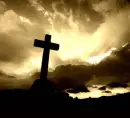 Cross Shining in Sunlight on a Hill 