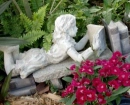 Little Marie Reading in the Garden