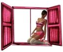 Woman kneels in the window
