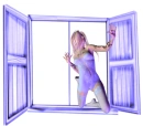 Woman kneels in the window