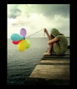 sad girl with balloons