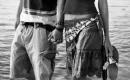 Two people holding hands