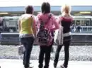  girls standing on platform