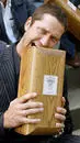Gerry Biting a Package