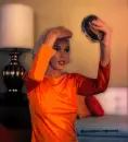 Marilyn Monroe looking in mirror