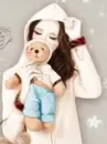 sweet girl holding teddy
