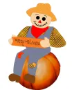 Scarecrow sitting on pumpkin