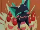 Suppi popping out of a cake.