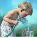 boy drinking out of waterhose