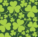 SHAMROCKS ON DARK BACKGROUND