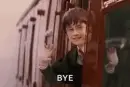boy on train saying bye gif