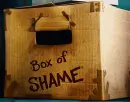 animated child hiding in box of shame gif