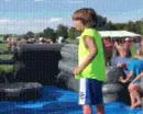 boy keeps getting knocked off outside attraction